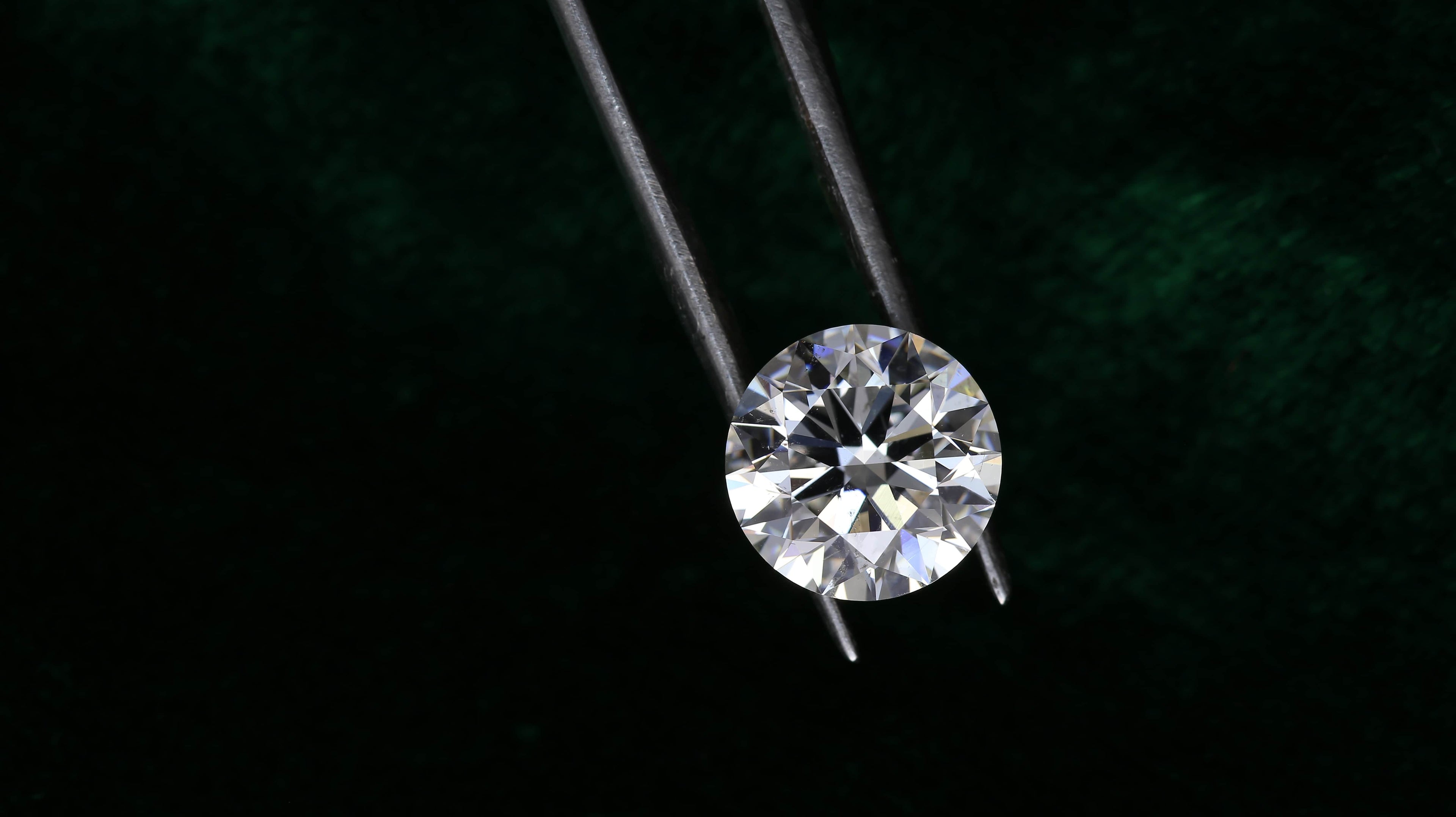 Round cut diamond guide and size chart - ELGA