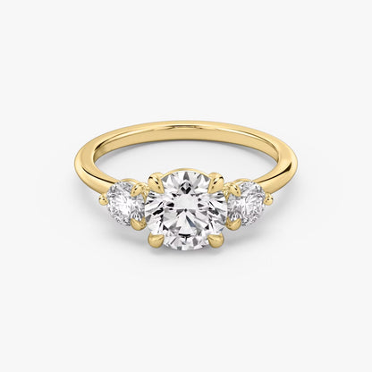 The Three Stone Round Brilliant with Round Side Stones Engagement Ring