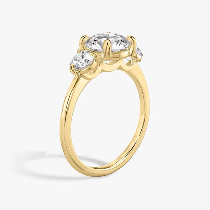 The Three Stone Round Brilliant with Round Side Stones Engagement Ring