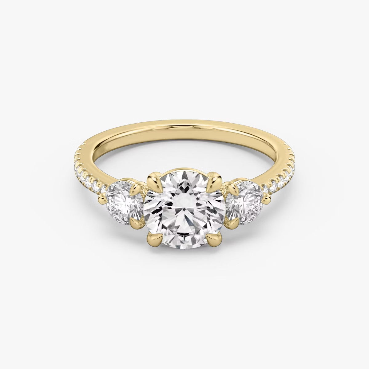 The Three Stone Round Brilliant with Round Side Stones Pave Engagement Ring