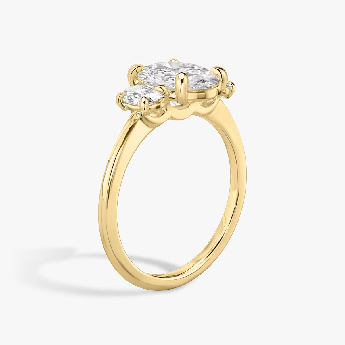 The Three Stone Oval with Oval sidestones Engagement Ring