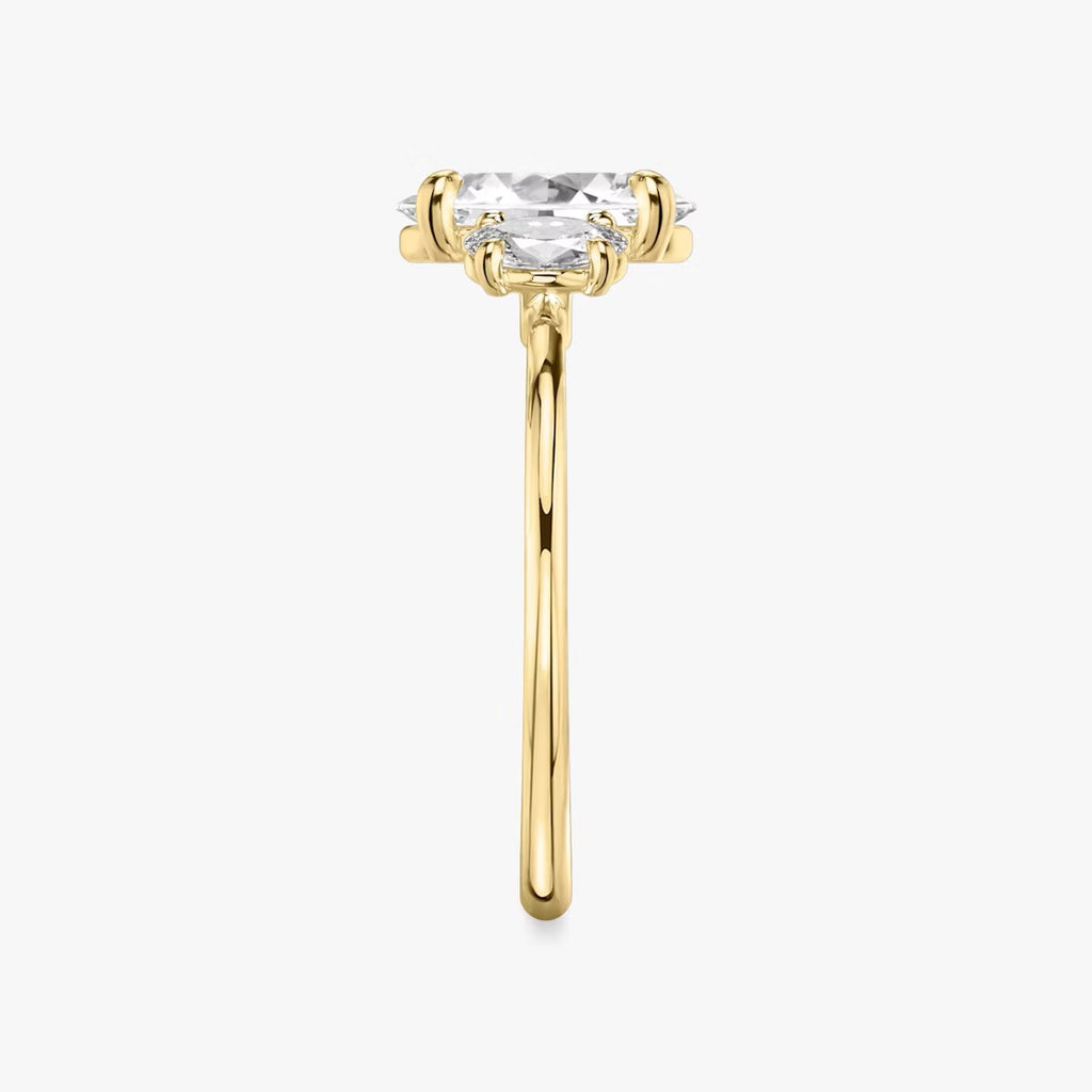 The Three Stone Oval with Oval sidestones Engagement Ring