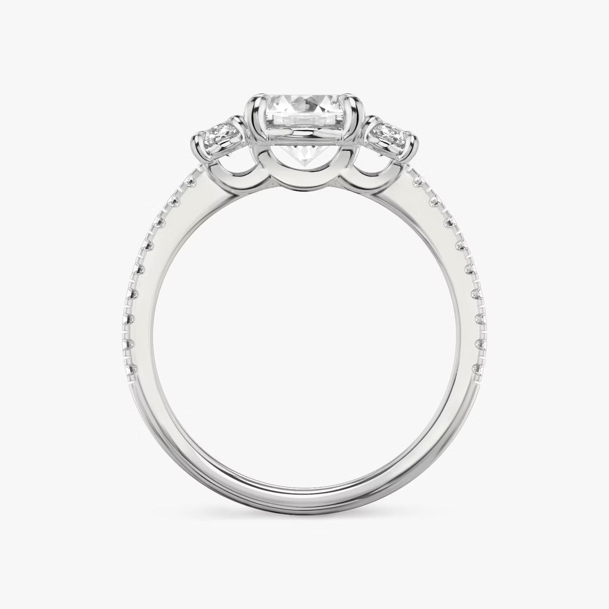 The Three Stone Oval with Oval Side Stones Pave Engagement Ring