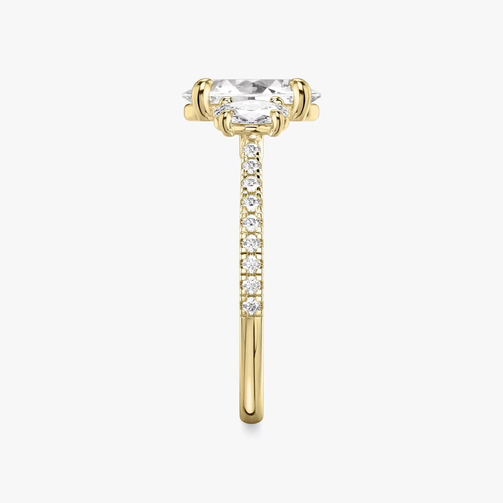 The Three Stone Oval with Oval Side Stones Pave Engagement Ring