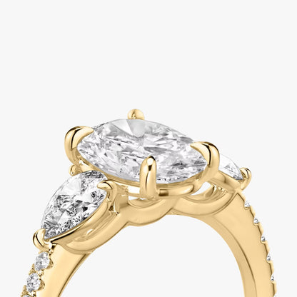 The Three Stone Oval with Pear Side Stones Pave Engagement Ring