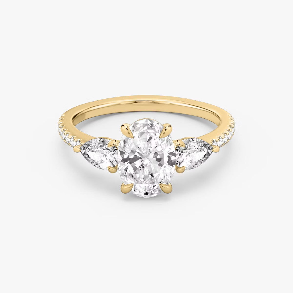 The Three Stone Oval with Pear Side Stones Pave Engagement Ring