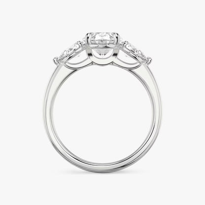 The Three Stone Oval with Pear side stones Engagement Ring