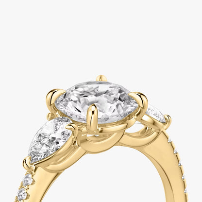 The Three Stone Round Brilliant with Pear Side Stones Pave Engagement Ring