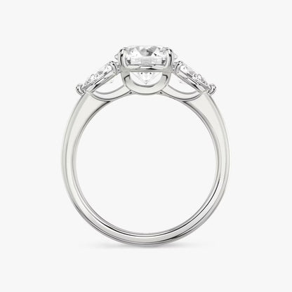 The Three Stone Round Brilliant With Pear Side Stones Engagement Ring