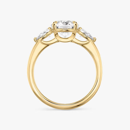 The Three Stone Round Brilliant With Pear Side Stones Engagement Ring