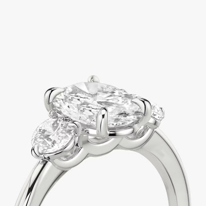 The Three Stone Oval with Round side stones Engagement Ring