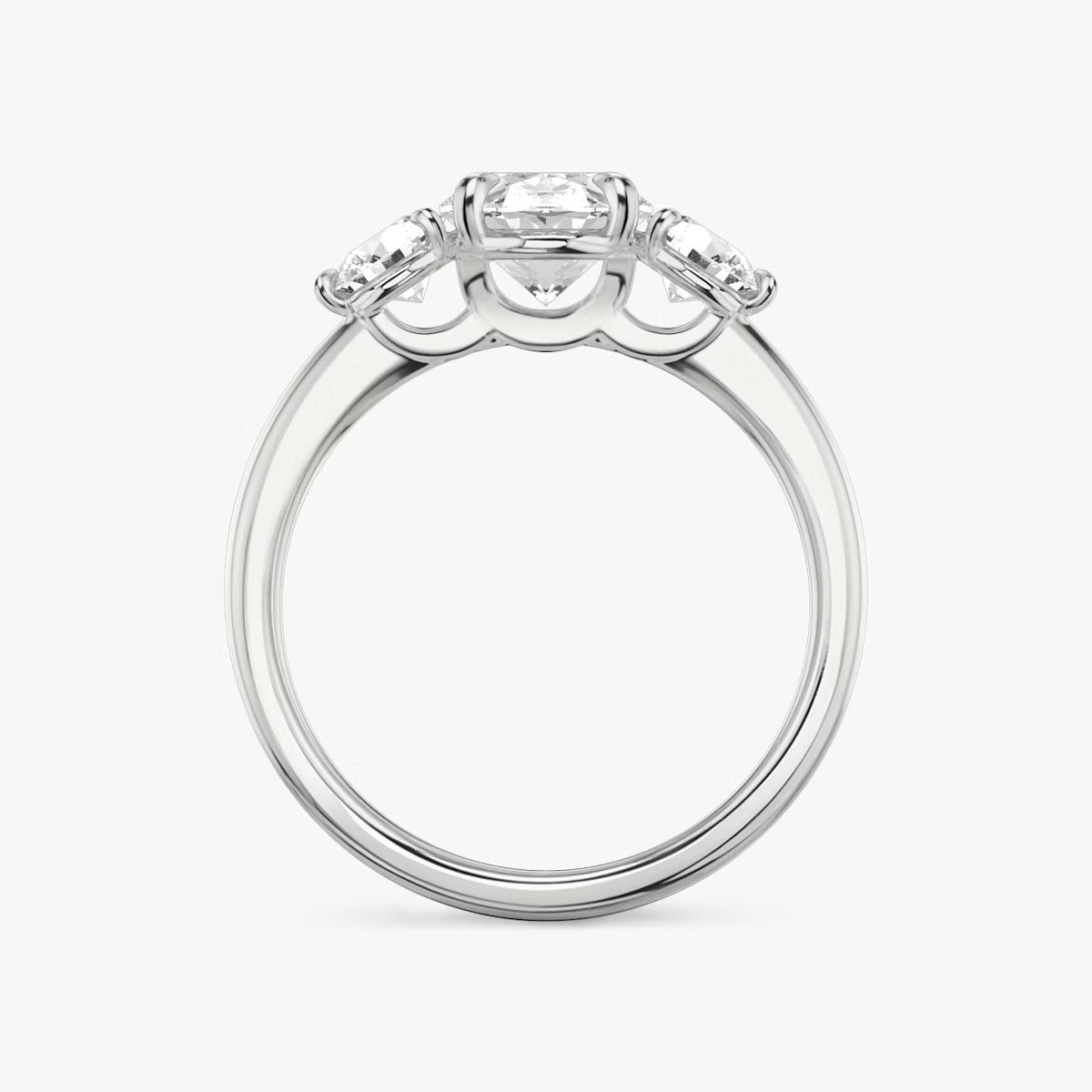 The Three Stone Oval with Round side stones Engagement Ring