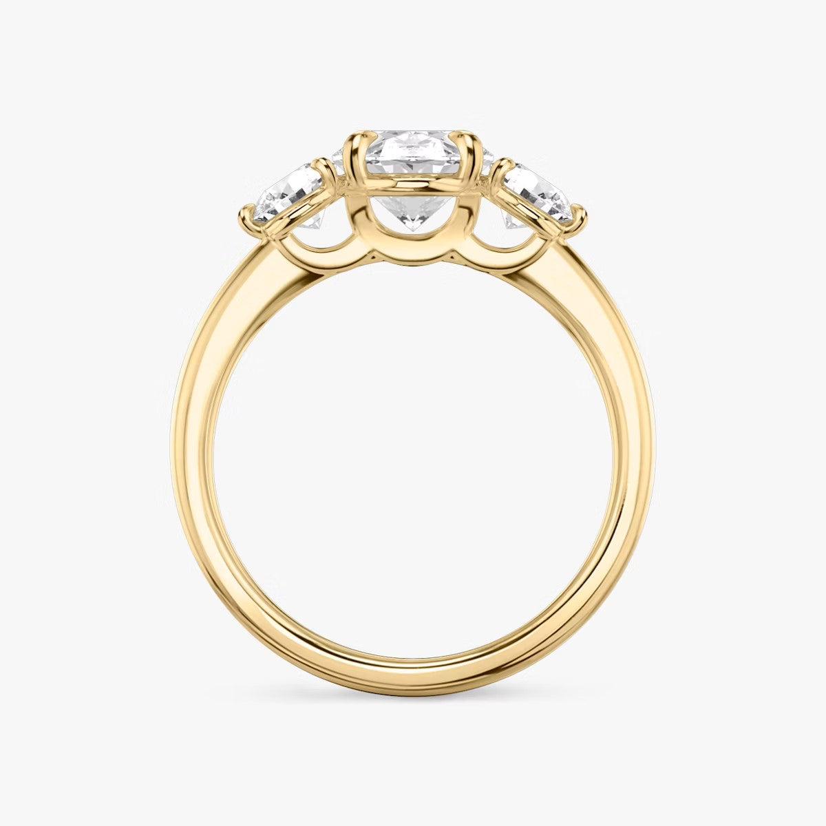 The Three Stone Oval with Round side stones Engagement Ring