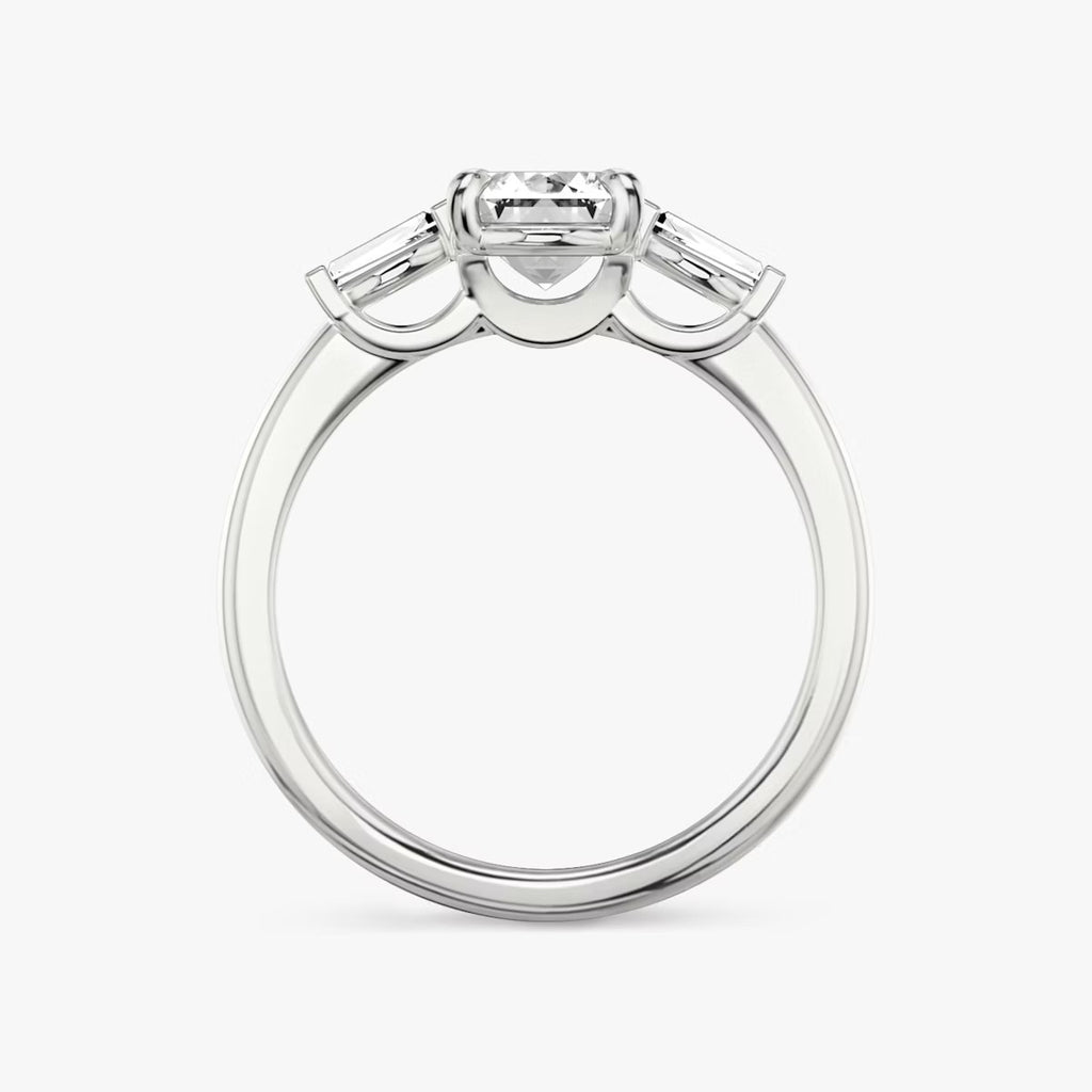 The Three Stone Emerald with Tapered baguette side stones Engagement Ring