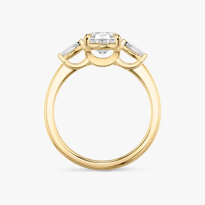 The Three Stone Oval with Tapered Baguette side stones Engagement Ring