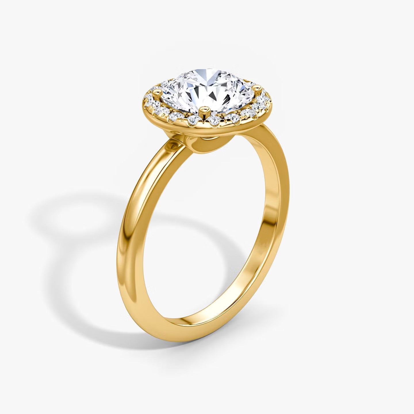 The Halo Round Brilliant Engagement Ring