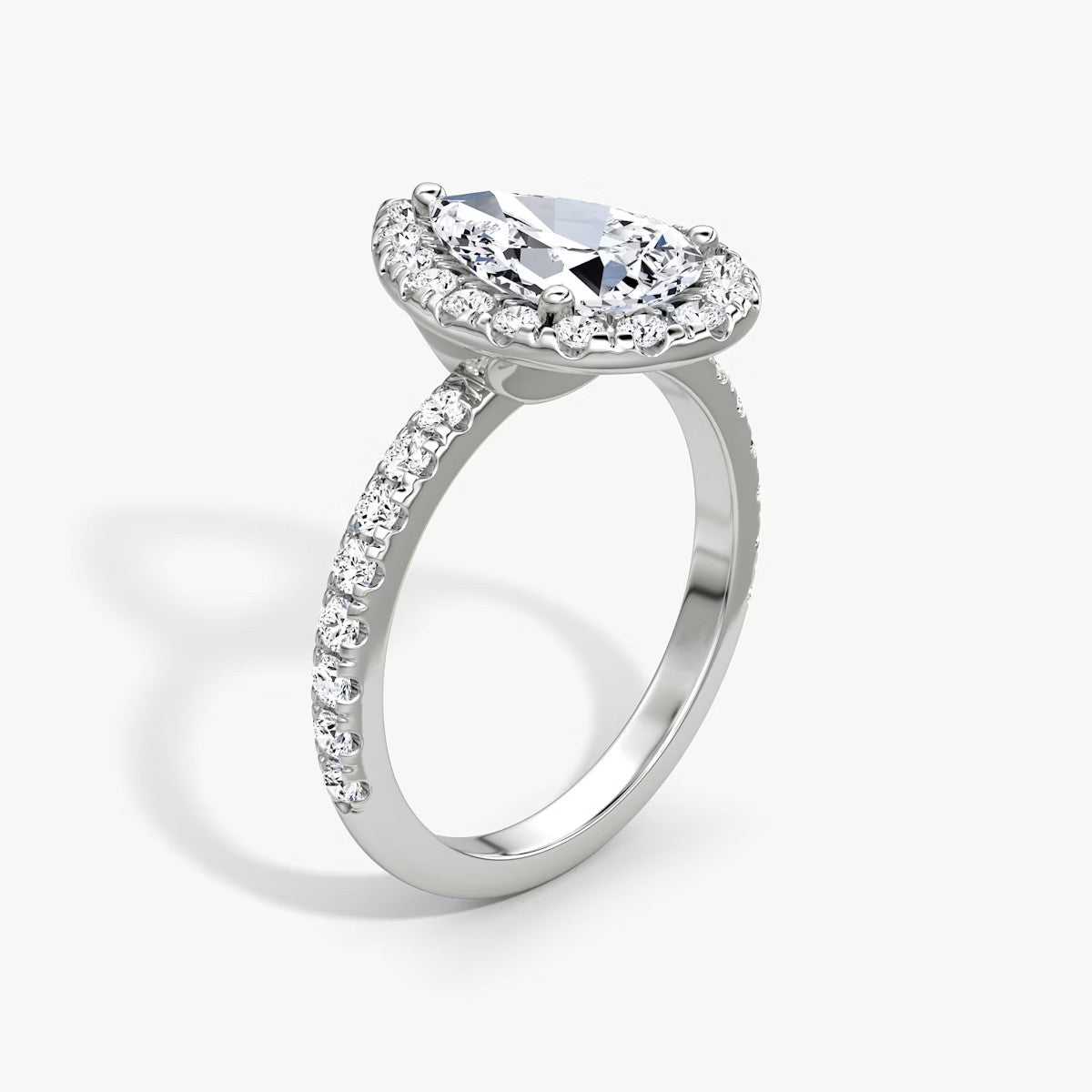 The Big Halo Pear Pave Engagement Ring