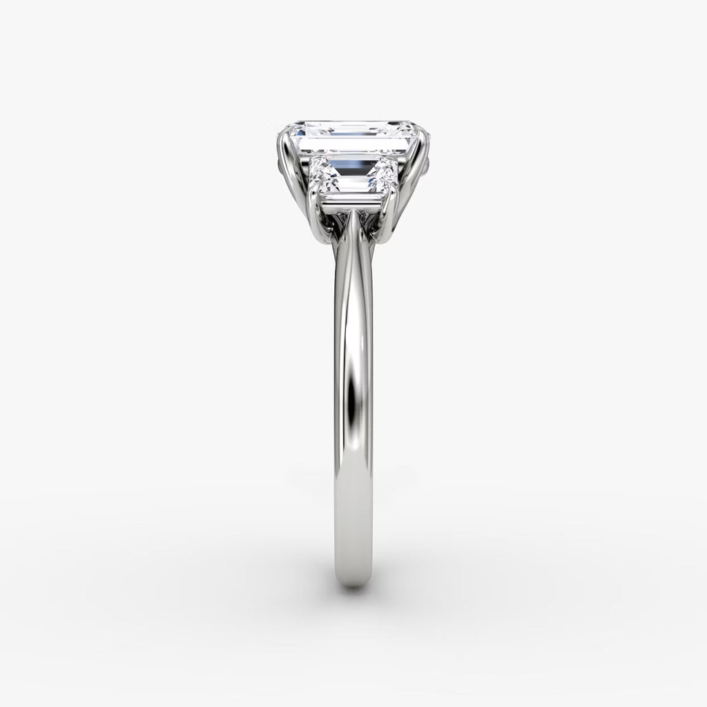 The Erelis Three Stone Emerald Engagement Ring