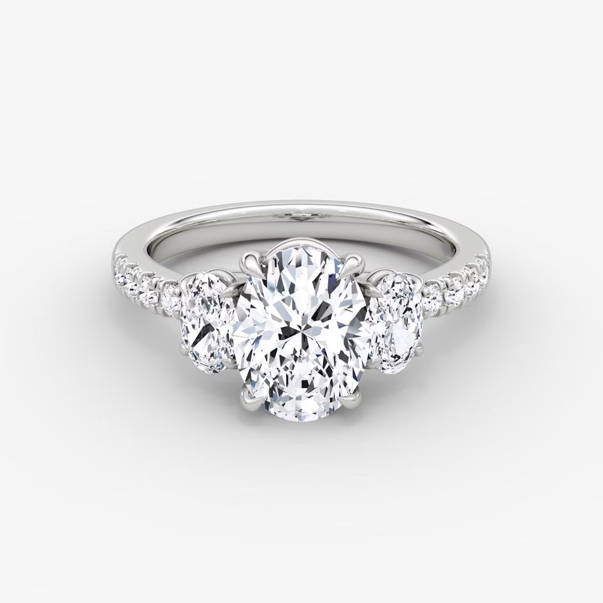 The Erelis Three Stone Oval with Pave Engagement Ring