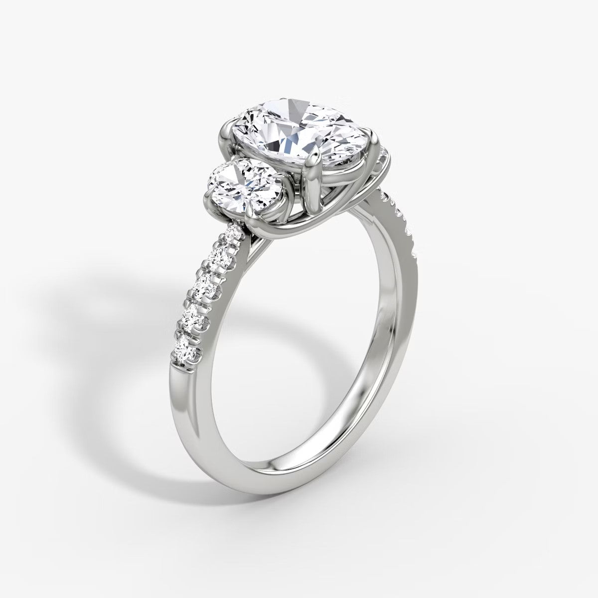 The Erelis Three Stone Oval with Pave Engagement Ring