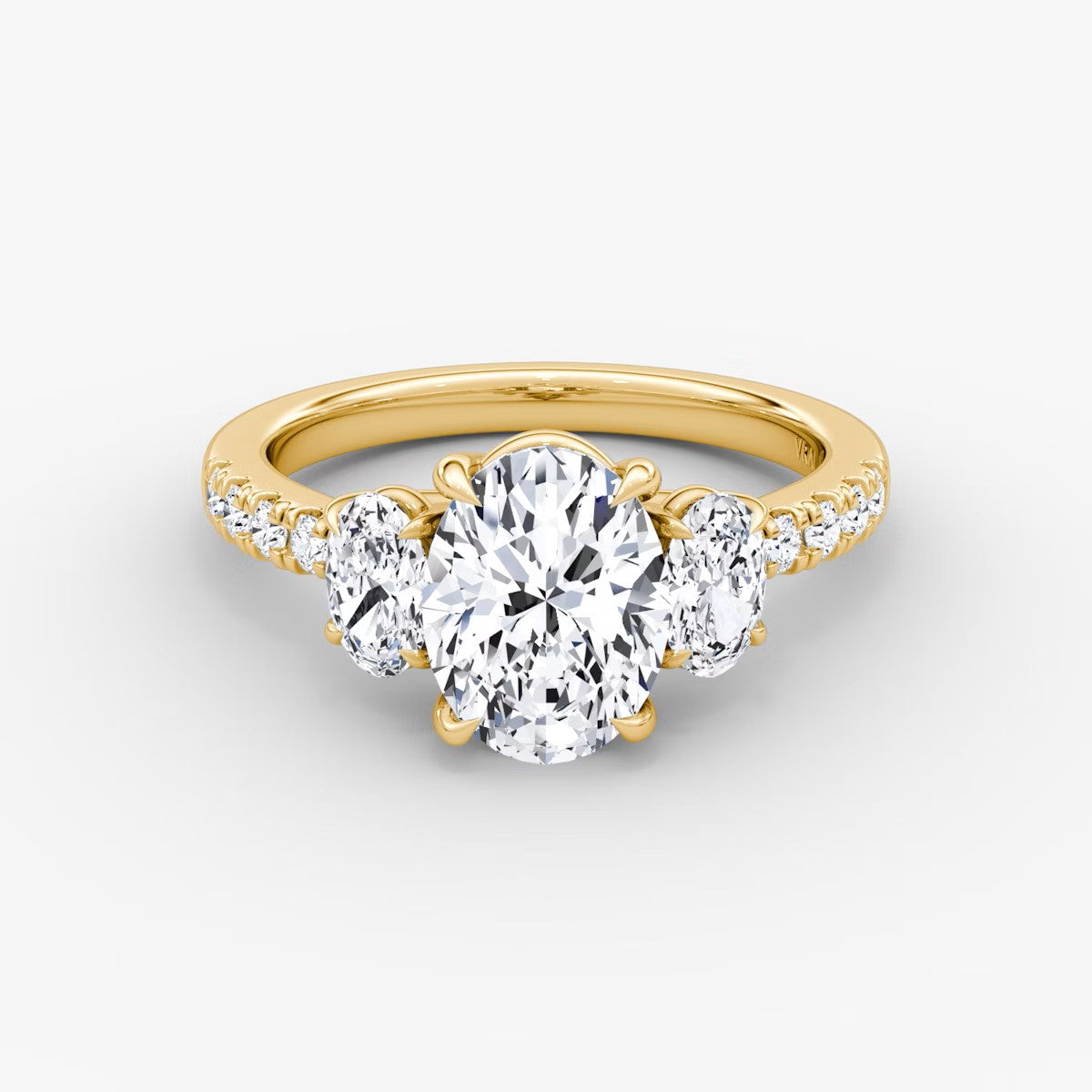 The Erelis Three Stone Oval with Pave Engagement Ring