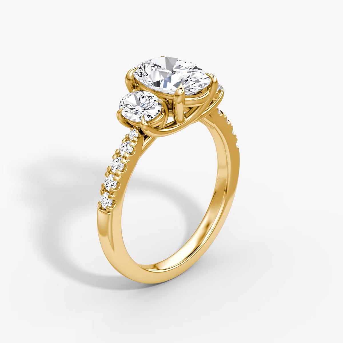 The Erelis Three Stone Oval with Pave Engagement Ring