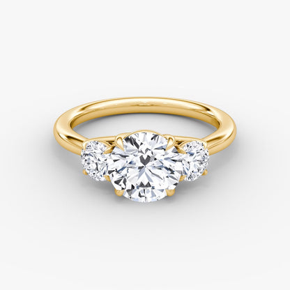 The Erelis Three Stone Round Brilliant Engagement Ring