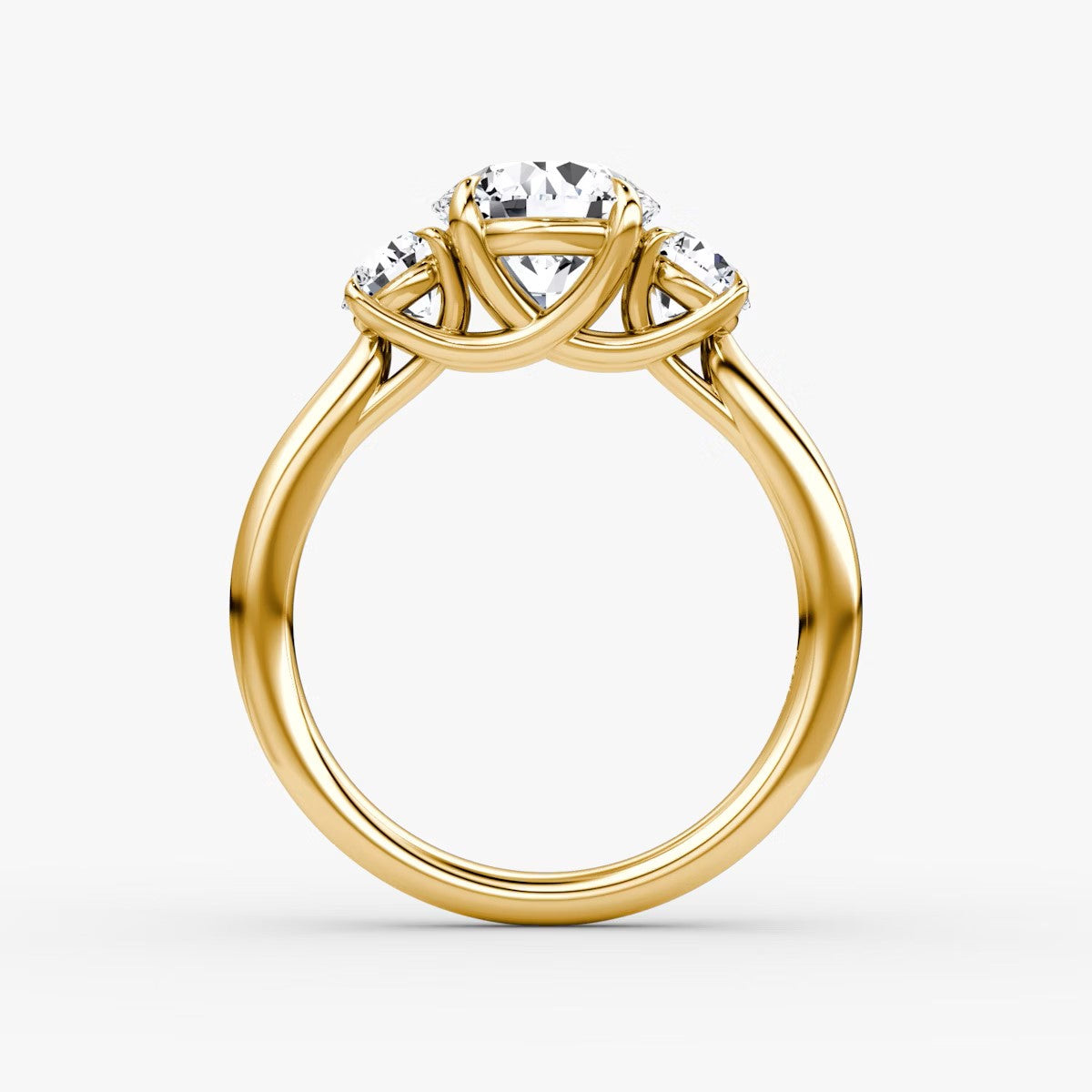 The Erelis Three Stone Round Brilliant Engagement Ring