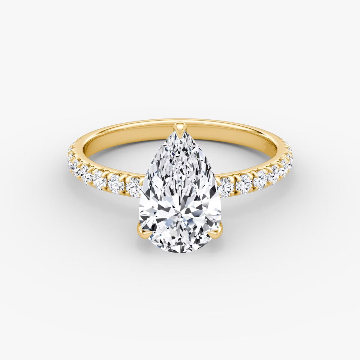 The Classic Pear Solitaire Pave Engagement Ring