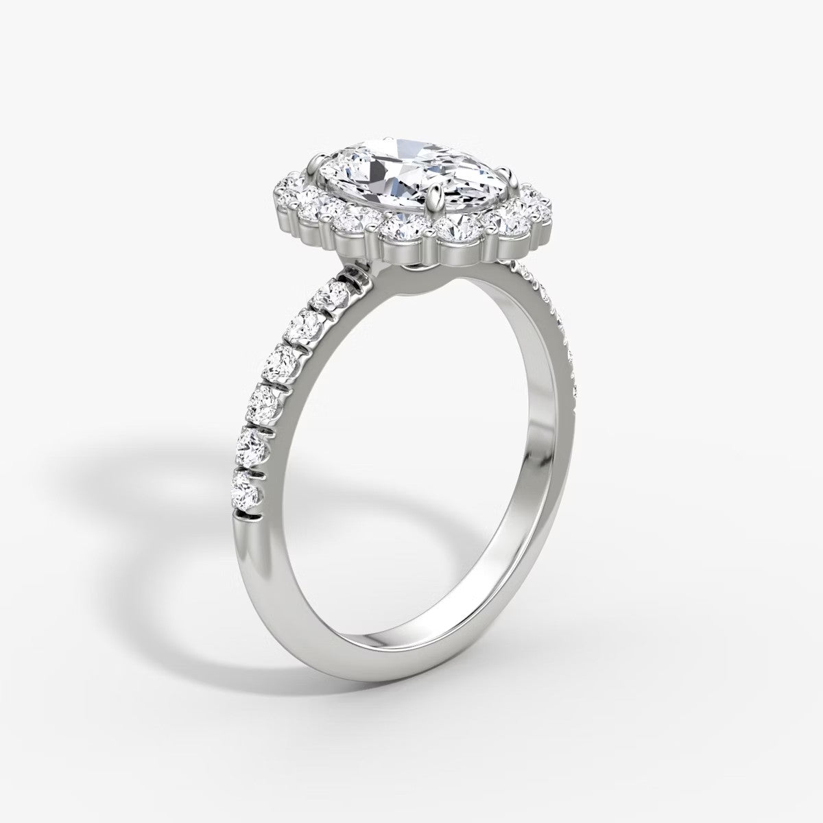 The Floral Halo Oval Pave Engagement Ring