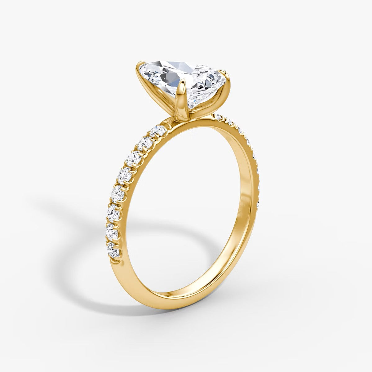 The Classic Pear Solitaire Pave Engagement Ring