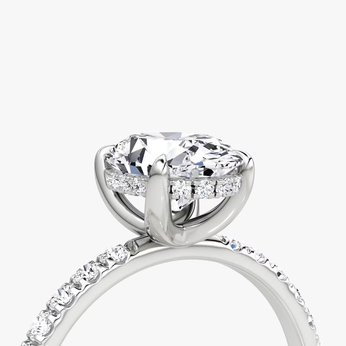 The Classic Oval Solitaire Hidden Halo Pave Engagement Ring