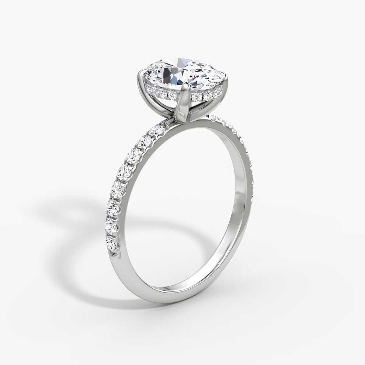 The Classic Oval Solitaire Hidden Halo Pave Engagement Ring