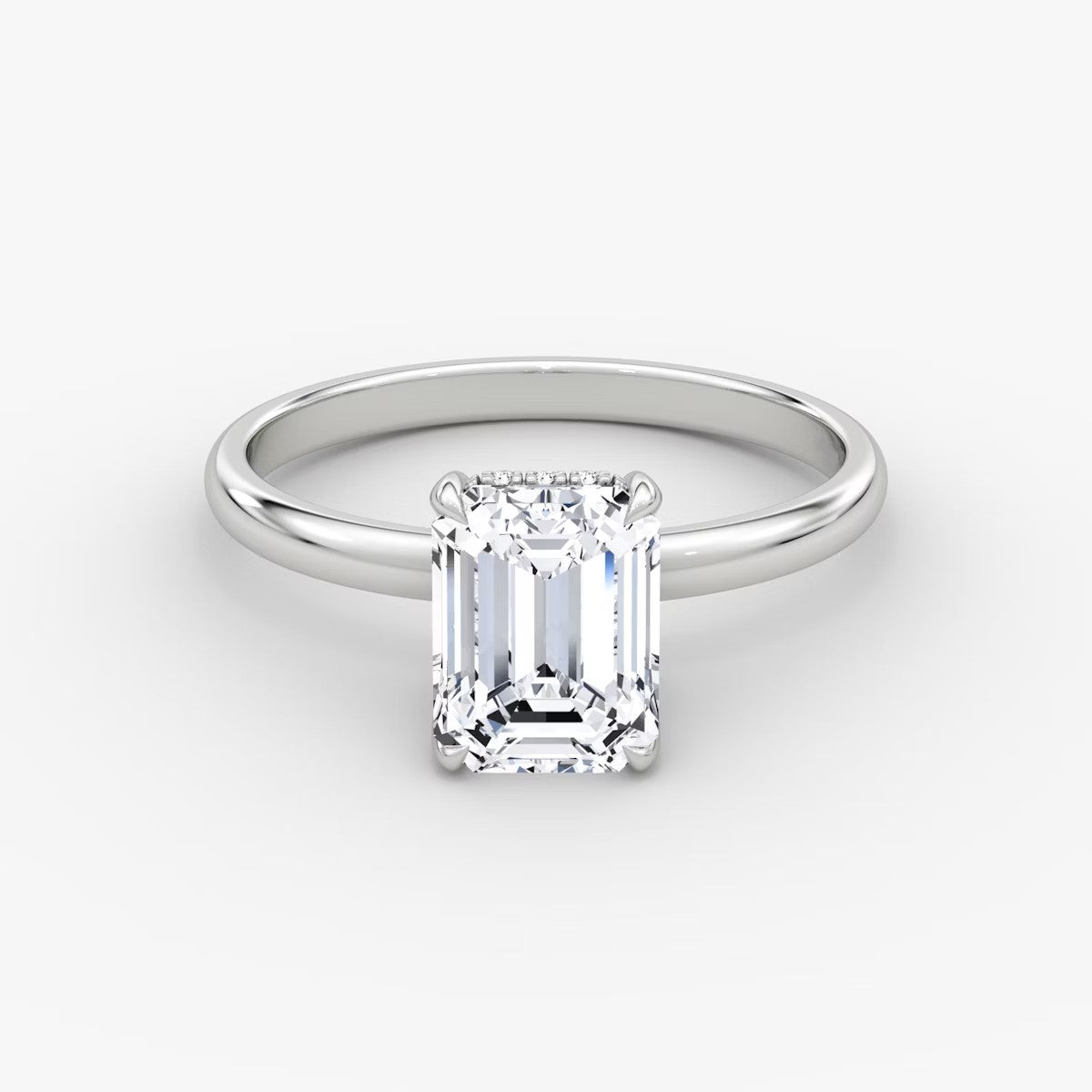 The Classic Emerald Cut Solitaire Hidden Halo Engagement Ring