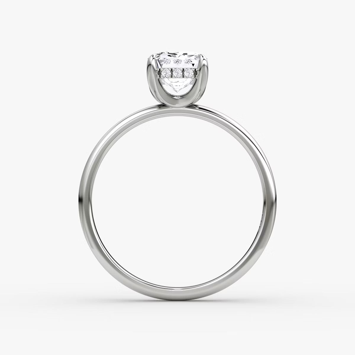 The Classic Emerald Cut Solitaire Hidden Halo Engagement Ring