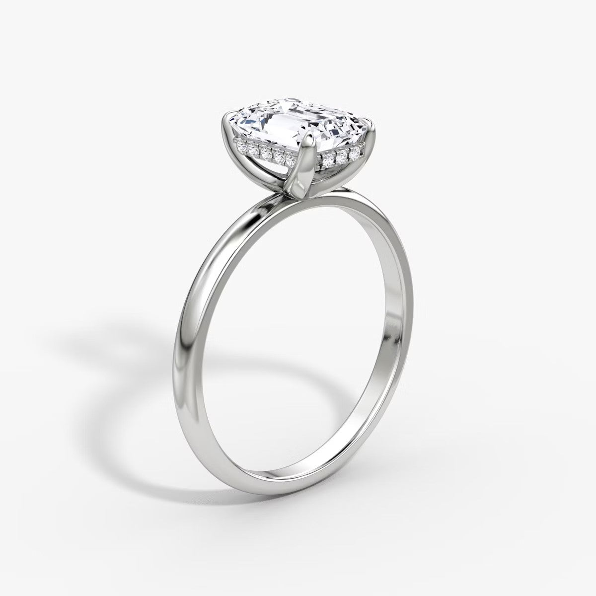 The Classic Emerald Cut Solitaire Hidden Halo Engagement Ring