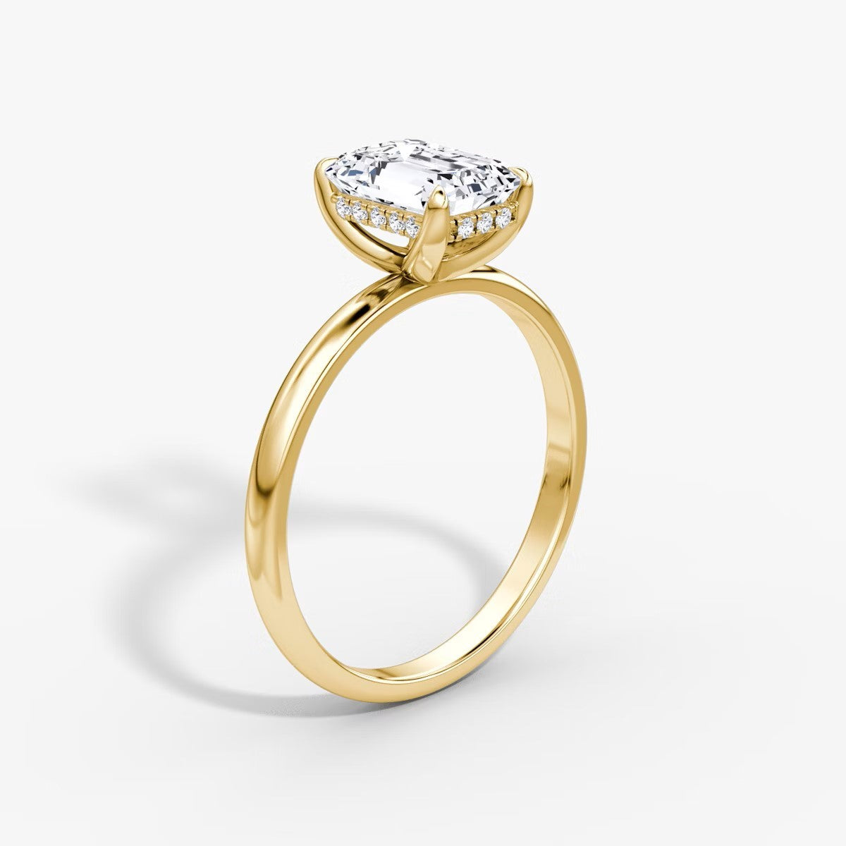 The Classic Emerald Cut Solitaire Hidden Halo Engagement Ring