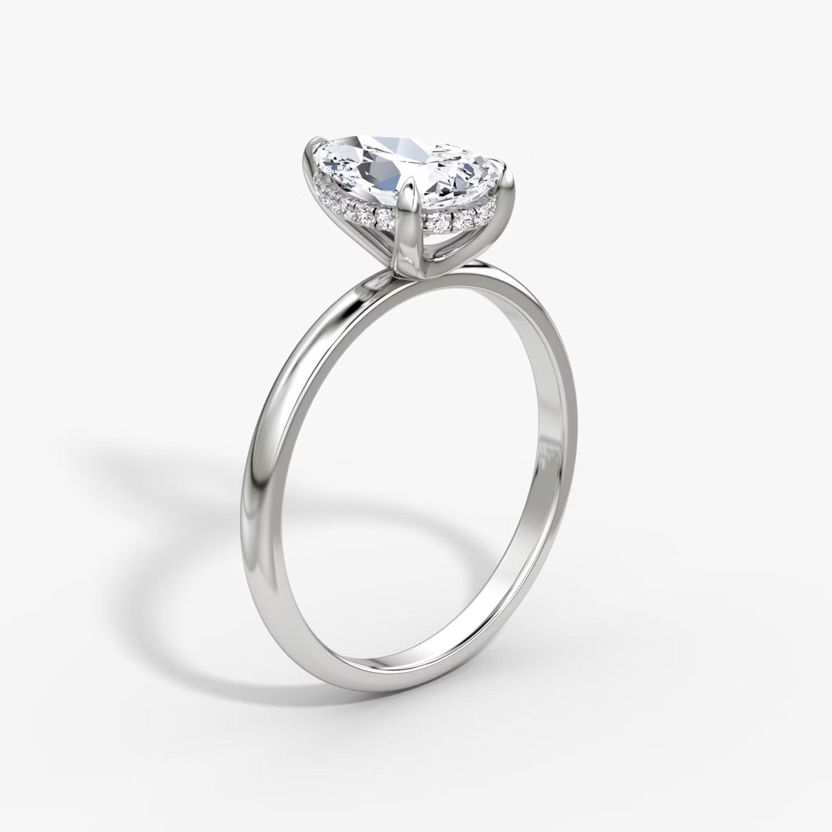 The Classic Pear Solitaire Hidden Halo Engagement Ring