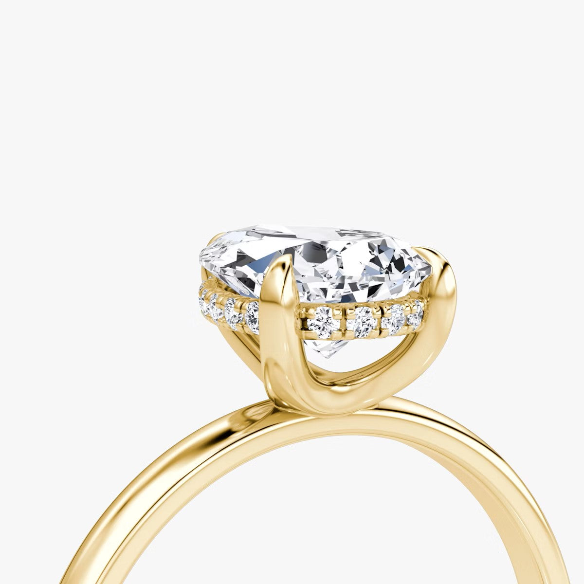 The Classic Pear Solitaire Hidden Halo Engagement Ring