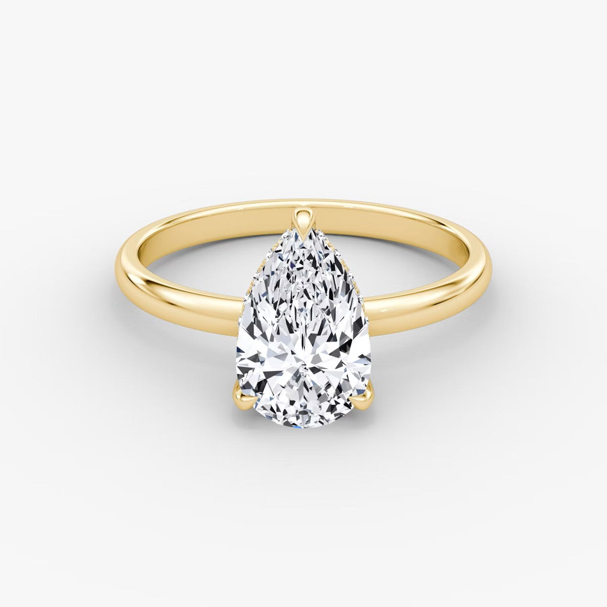 The Classic Pear Solitaire Hidden Halo Engagement Ring