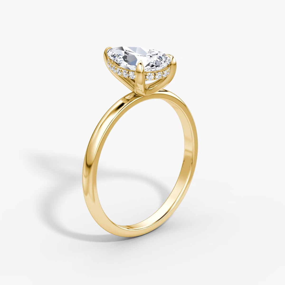 The Classic Pear Solitaire Hidden Halo Engagement Ring