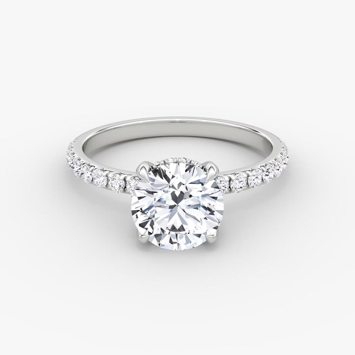 The Classic Round Brilliant Solitaire Hidden Halo Pave Engagement Ring