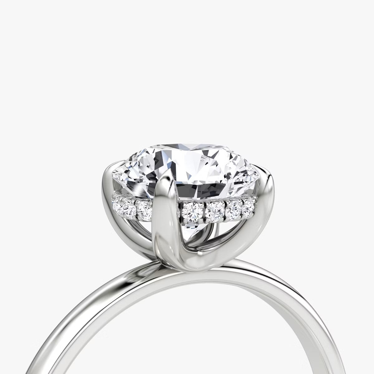 The Classic Round Brilliant Solitaire Hidden Halo Engagement Ring