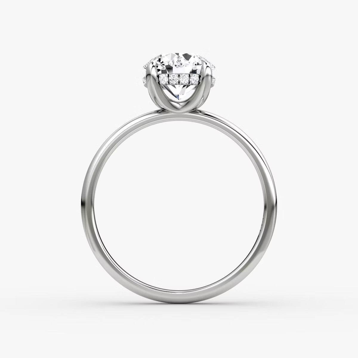 The Classic Round Brilliant Solitaire Hidden Halo Engagement Ring