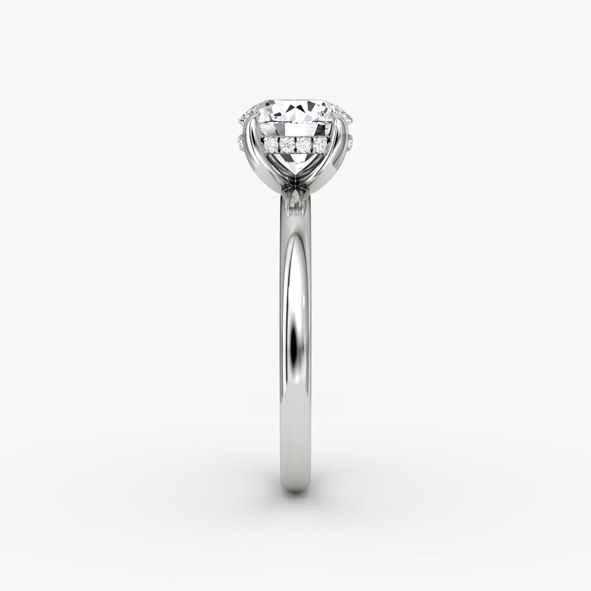 The Classic Round Brilliant Solitaire Hidden Halo Engagement Ring