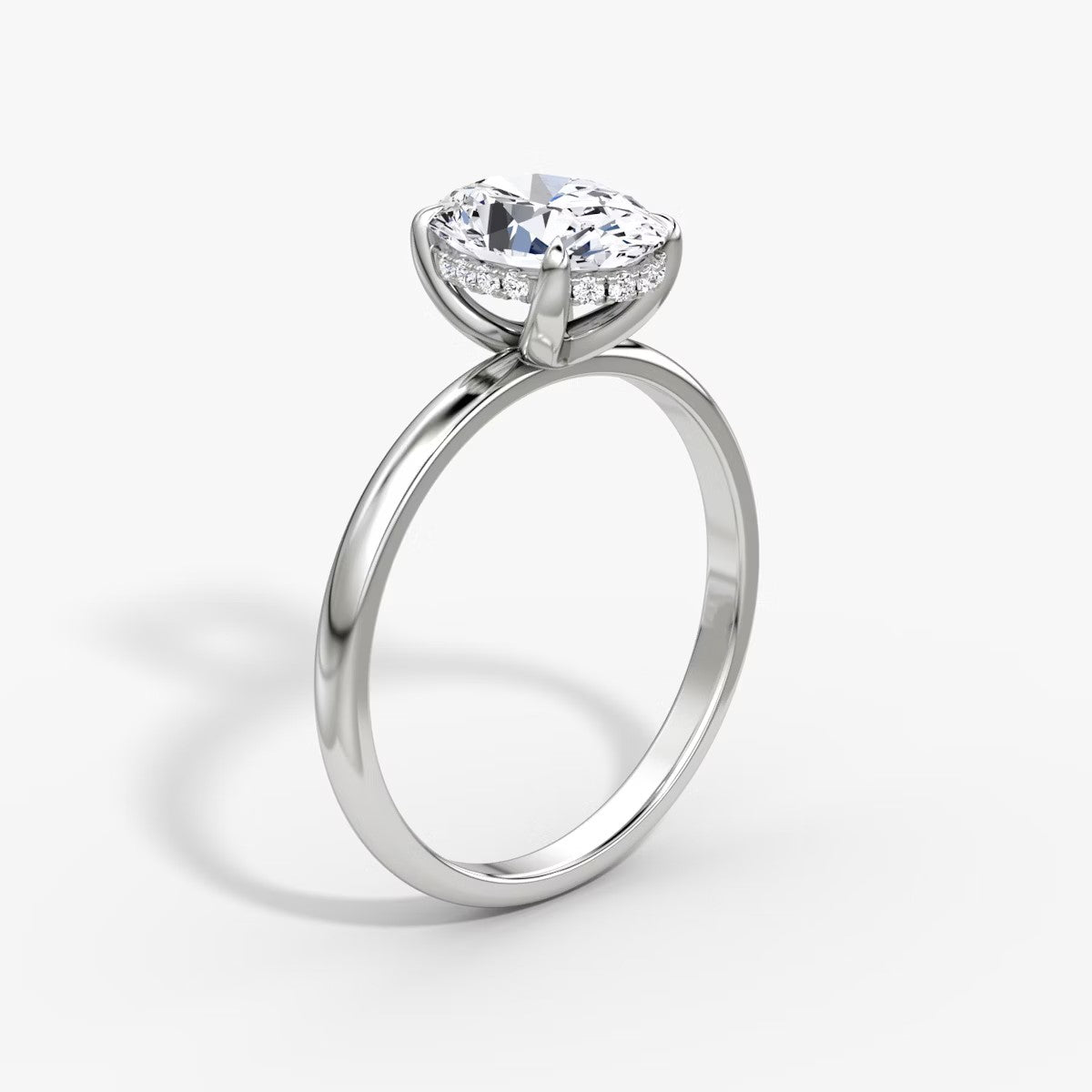 The Classic Oval Solitaire Hidden Halo Engagement Ring