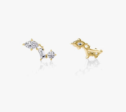 a pair of gold earrings with diamonds