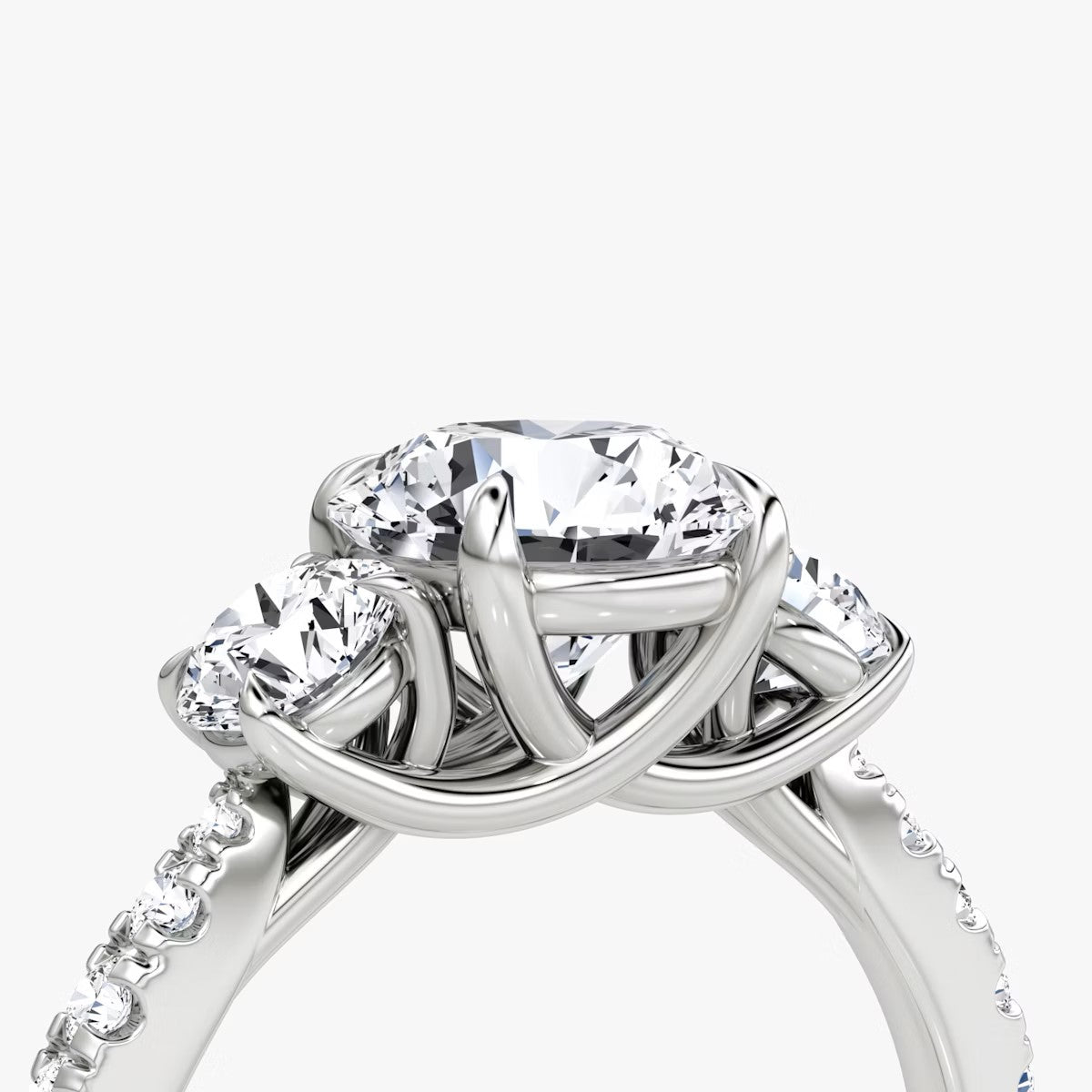 The Erelis Three Stone Round Brilliant Pave Engagement Ring