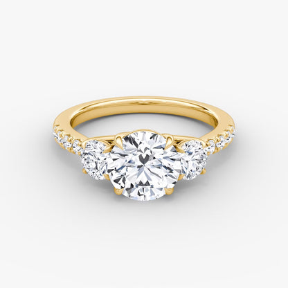 The Erelis Three Stone Round Brilliant Pave Engagement Ring