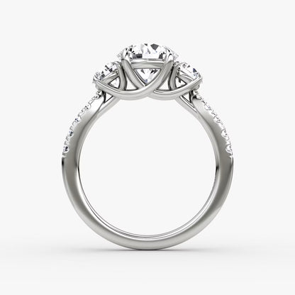 The Erelis Three Stone Round Brilliant Pave Engagement Ring